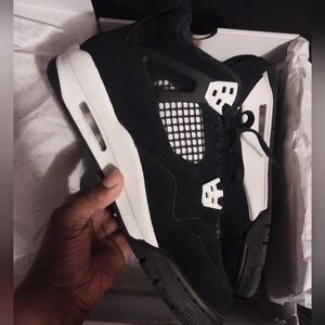 Jordan Air 4 Retro Black and White Thunders